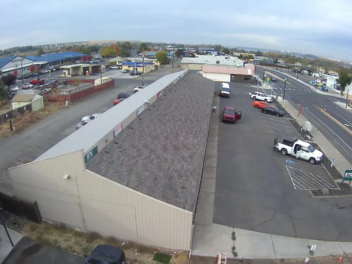 Commercial shingle roof on a strip center building