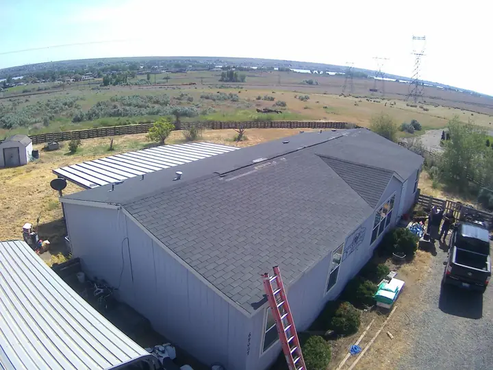 Manufactured home with a new shingle roof