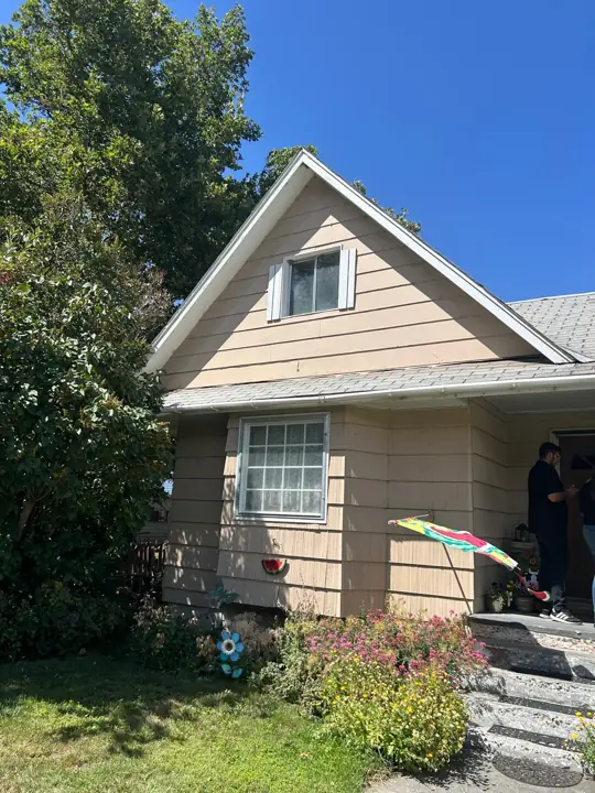 Two-story home with a replaced roof